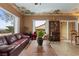 Bright living room with tile floors and sliding door access at 2151 Bannerwood St, Henderson, NV 89044