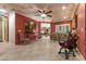 Spacious living room featuring an artistic ceiling, tile floors, and ample seating at 2151 Bannerwood St, Henderson, NV 89044