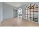 Primary bedroom with lots of natural light, arched windows, tile floors and a closet at 218 S Bruce St, Las Vegas, NV 89101