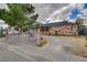 Brick home with a circular driveway and partial fencing at 218 S Bruce St, Las Vegas, NV 89101