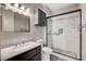 Bathroom featuring a glass shower enclosure, vanity with sink, and modern fixtures at 3012 Anna Bay Dr, Las Vegas, NV 89134