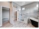 Stylish bathroom with a soaking tub, glass shower, and double vanity, creating a spa-like atmosphere at 3012 Anna Bay Dr, Las Vegas, NV 89134