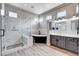 Stylish bathroom with a soaking tub, glass shower, and double vanity, creating a spa-like atmosphere at 3012 Anna Bay Dr, Las Vegas, NV 89134
