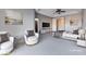 Staged main bedroom features neutral decor, carpeted floors, and an abundance of natural light at 3012 Anna Bay Dr, Las Vegas, NV 89134