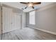 Modern bedroom features a ceiling fan and a large closet for optimal organization and comfort at 3012 Anna Bay Dr, Las Vegas, NV 89134