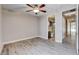 Bedroom with wood-look floors offering access to the ensuite bathroom at 3012 Anna Bay Dr, Las Vegas, NV 89134