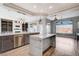 Kitchen features a large island with seating, stainless steel appliances and ample counter space at 3012 Anna Bay Dr, Las Vegas, NV 89134