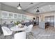 Spacious kitchen with gray cabinets, center island, modern appliances, and casual dining area at 3012 Anna Bay Dr, Las Vegas, NV 89134
