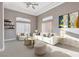 Comfortable living room featuring plush seating, modern decor, and plenty of natural light at 3012 Anna Bay Dr, Las Vegas, NV 89134