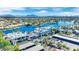 Aerial view of a charming business center with lake view, ample parking, and picturesque landscaping at 3109 Siena Cir, Las Vegas, NV 89128