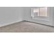 Empty room featuring a window seat and carpet flooring at 3109 Siena Cir, Las Vegas, NV 89128