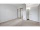 Bright bedroom features neutral carpet, mirrored closet doors, and a floor lamp at 3152 Centavo Dr, Las Vegas, NV 89117
