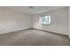 Well-lit bedroom features carpet flooring, natural light and a large window at 3152 Centavo Dr, Las Vegas, NV 89117