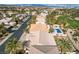 Residential aerial showcasing rooftop, refreshing blue pool, and beautiful palm trees, a perfect Gathering retreat at 33 Chateau Whistler Ct, Las Vegas, NV 89148