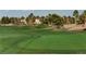 Well maintained golf course with a winding path in a residential community at 33 Chateau Whistler Ct, Las Vegas, NV 89148