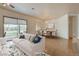 Open concept living room with hardwood floors and backyard access at 33 Chateau Whistler Ct, Las Vegas, NV 89148