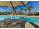 Relaxing poolside scene with lounge chairs and a waterpark backdrop for ultimate leisure at 33 Chateau Whistler Ct, Las Vegas, NV 89148