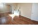 Bedroom features wood floors, mirrored closet, and natural light at 3905 E Cherokee Ave, Las Vegas, NV 89121