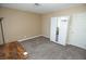 Bedroom with a desk, carpet, window, and wardrobe at 3905 E Cherokee Ave, Las Vegas, NV 89121