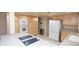 Bright kitchen with a cooktop island, wooden cabinetry, and white appliances at 3905 E Cherokee Ave, Las Vegas, NV 89121