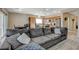 Open-concept living area seamlessly connecting to the kitchen and dining space, perfect for modern living and entertaining at 4459 S Glory Vine Ln, Pahrump, NV 89061