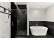 This bathroom features a soaking tub and a tiled walk-in shower with dual shower heads at 4525 Dean Martin Dr # 511, Las Vegas, NV 89103
