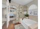Bathroom features a large soaking tub, glass shower, and views to the bedroom at 4647 Stearman Dr, North Las Vegas, NV 89031