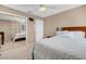 Bedroom features a bed, closet with mirror doors, and neutral-toned walls at 4647 Stearman Dr, North Las Vegas, NV 89031