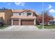 Charming two-story home with a three-car garage, tile roof, and well-maintained landscaping at 4647 Stearman Dr, North Las Vegas, NV 89031