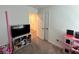 Bright bedroom featuring neutral carpeting and white walls at 4924 Chidlaw Ave # 3, Las Vegas, NV 89115