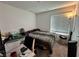 Bedroom with neutral carpet, large window with blinds, and ample space at 4924 Chidlaw Ave # 3, Las Vegas, NV 89115