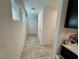 Hallway features clean, neutral walls, multiple doors and tile flooring at 4924 Chidlaw Ave # 3, Las Vegas, NV 89115