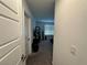Brightly lit hallway offers an inviting transition to the living spaces at 4924 Chidlaw Ave # 3, Las Vegas, NV 89115