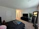 Expansive Primary bedroom showcases ample natural light, complemented by a dark accent wall at 4924 Chidlaw Ave # 3, Las Vegas, NV 89115
