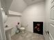 Stylish powder room features a pedestal sink and tiled flooring at 4924 Chidlaw Ave # 3, Las Vegas, NV 89115