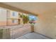 View from balcony with metal railing, overlooking landscaped common area of community at 5000 Red Rock St # 120, Las Vegas, NV 89118