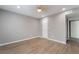 Spacious bedroom showcasing wood-look flooring, ceiling fan, and closet at 5000 Red Rock St # 120, Las Vegas, NV 89118