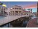 Well-maintained clubhouse with a pool and reflective water features, perfect for recreation and relaxation at 5000 Red Rock St # 120, Las Vegas, NV 89118
