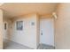 Exterior entrance showing unit 120 with a white door and security lock at 5000 Red Rock St # 120, Las Vegas, NV 89118