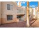 Well-maintained condo complex featuring balconies and desert landscaping, offering a comfortable residential atmosphere at 5000 Red Rock St # 120, Las Vegas, NV 89118