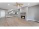 Living room with wood floors, fireplace and ceiling fan at 5000 Red Rock St # 120, Las Vegas, NV 89118