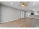 Inviting living room featuring hardwood floors, neutral walls, and recessed lighting at 5000 Red Rock St # 120, Las Vegas, NV 89118