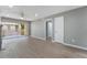 Bright living area with hardwood floors, recessed lighting, and a sliding glass door leading to a balcony at 5000 Red Rock St # 120, Las Vegas, NV 89118