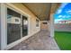 Patio area with pavers and artificial turf grass at 5040 Serene Skies St, Las Vegas, NV 89130