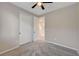 Neutral bedroom featuring carpet, closet and ceiling fan at 5040 Serene Skies St, Las Vegas, NV 89130