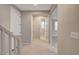 Welcoming foyer featuring wood-look tile flooring and neutral paint at 5040 Serene Skies St, Las Vegas, NV 89130