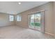 Open living area featuring a backyard view with patio access at 5040 Serene Skies St, Las Vegas, NV 89130