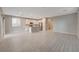 Spacious and bright living area with recessed lighting and open to the kitchen at 5040 Serene Skies St, Las Vegas, NV 89130