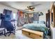 Cozy bedroom with a colorful decor and a ceiling fan at 5706 W Lake Mead Blvd, Las Vegas, NV 89108