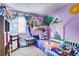 Playful bedroom with colorful walls, themed bedding, and unique decor at 5706 W Lake Mead Blvd, Las Vegas, NV 89108